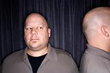 Bald twin men.