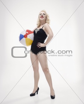 Woman with beach ball.