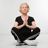 Senior woman meditating.
