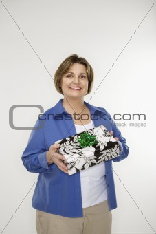Woman holding gift.