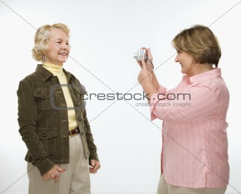 Women using digital camera.