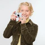 Woman using digital camera.