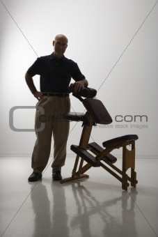 Massage therapist and chair.