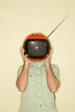 Television replacing man's head.