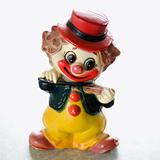 Vintage clown figurine.