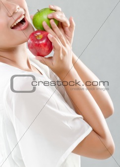young pretty girl loves apples