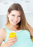 Charming woman drinking orange juice