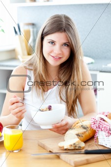 Beautiful woman eating breakfast