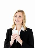 Confident businesswoman drinking a cup of coffee isolated on a white background