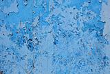 Old grungy blue paint on wooden surface
