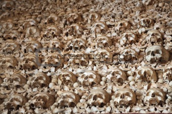 Wall of human bones and skulls. Chapel Capela de Ossos in Faro, Portugal