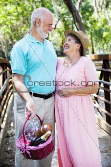 Romantic Seniors with Picnic Basket