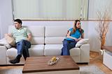 couple relax at home on sofa in living room