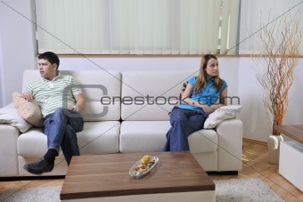 couple relax at home on sofa in living room