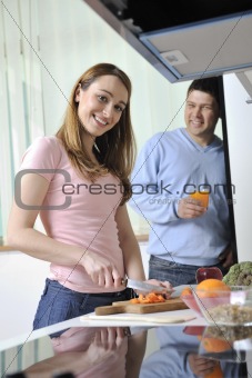 couple have fun and preparing healthy food in kitchen