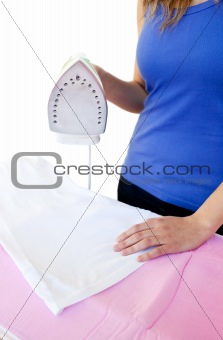 Close-up of a woman ironing