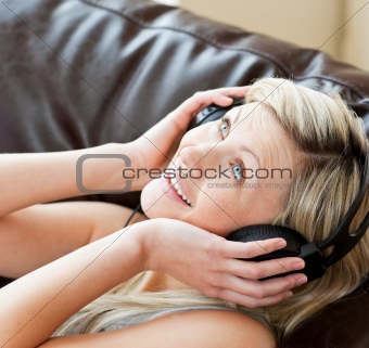 Smiling woman using headphones 