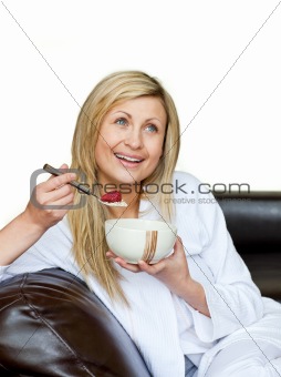 Attractive woman having a breakfast 