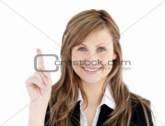 Cheerful businesswoman pointing upward isolated 