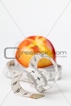 Tape measure and nectarine
