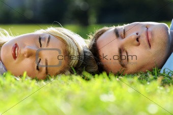 Sleeping couple in the park