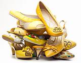 Pile of female yellow shoes