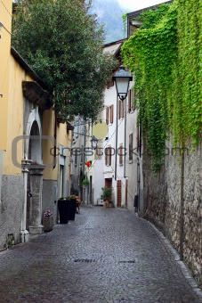View of a narrow street in Arco, North Italy