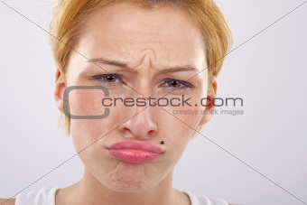  woman pulling a face