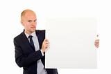 man holding a white board