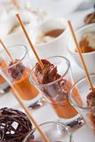 Asian Fusion lamb on stick in shot glass with sauce
