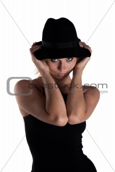 young woman in a black dress and a hat