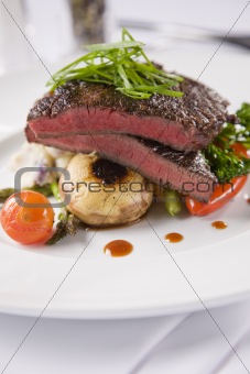 Steak with mushrooms and potato bake