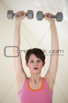 Young Woman Weight Training