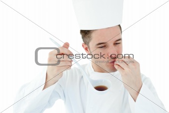 Enthusiastic cook holding  a soup