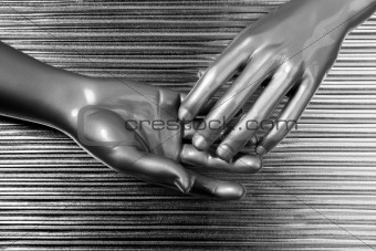 hands together futuristic robot silver steel