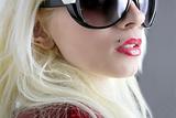 blond fashion girl portrait red lips gray grunge background