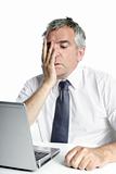 stressed senior businessman gesture work laptop