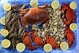Crabs tellin shrimp clams and lemon