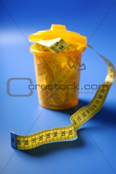 Centimeter tape meter on the trash