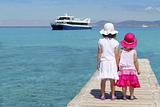 happy girl tourist turquoise sea back in Formentera