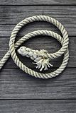 marine rope over gray aged teak wood