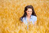 Young girl on wheat field