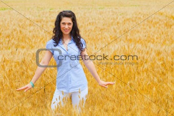 Young girl on wheat field