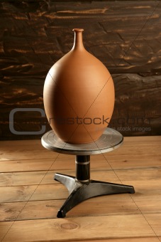 potter wheel with pottery clay vase finished