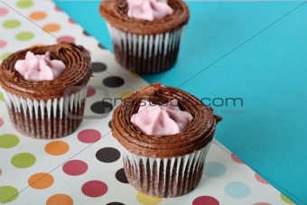 shot of polka dot raspberry filled cupcakes