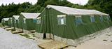 Green tent camp in Pyrenees for  Santiago pilgrims