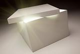 White Box with Lid Revealing Something Very Bright on a Grey Background.