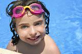 beautiful little girl smiling in   pool