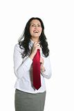 Brunette woman adjusting her necktie
