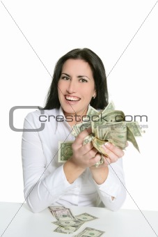 Dollar notes in happy brunette woman hands